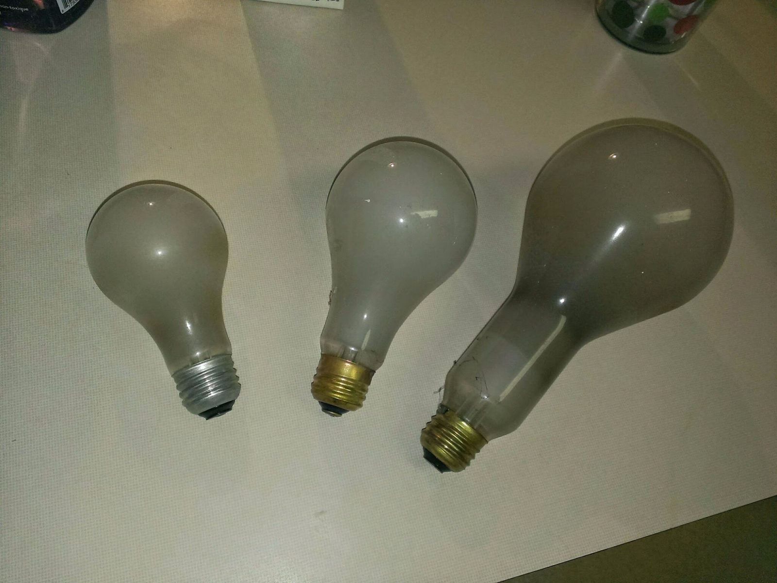 These are some old bulbs that I found in my home. From left to right is a standard 65 W, 200 W, and 300 W!